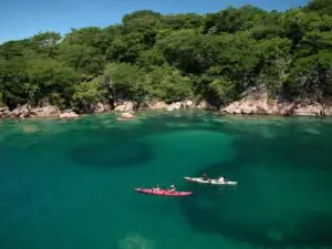 Kayaking on Lake Malawi at Mumbo Island Camp.
