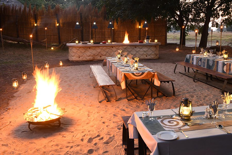 Enjoy sumptuous meals fireside in the Boma, a safari highlight. 