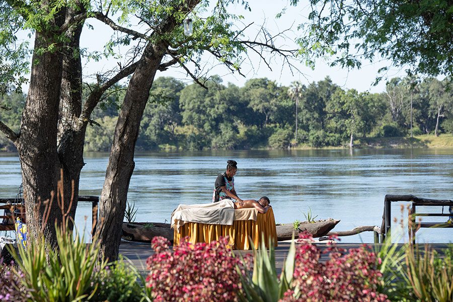 Spoil yourself with a massage on the edge of the Zambezi River.