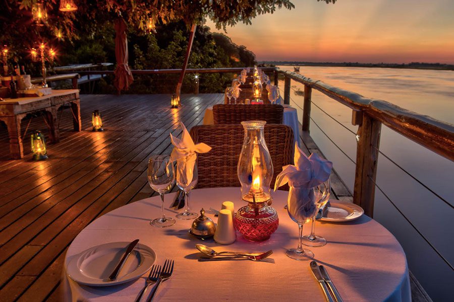 Dine at the edge of luxury safari lodges and camps in Botswana.