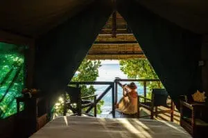 Relax on your private deck overlooking the beachfront at Masoala Lodge.