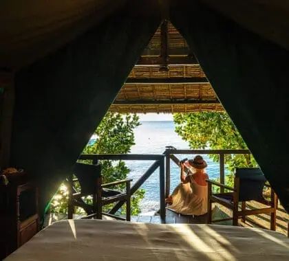 Relax on your private deck overlooking the beachfront at Masoala Lodge.