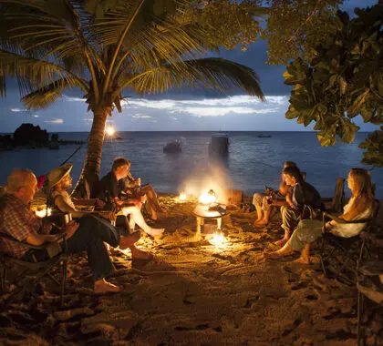 Sundowners are best enjoyed by the fireplace on the white sandy beaches.