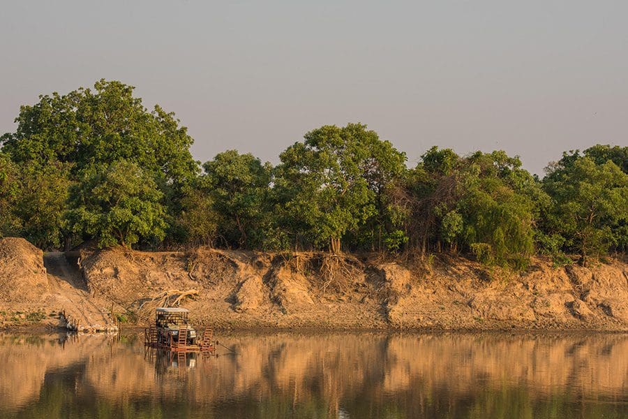 Cross the river to camp on the river pontoon