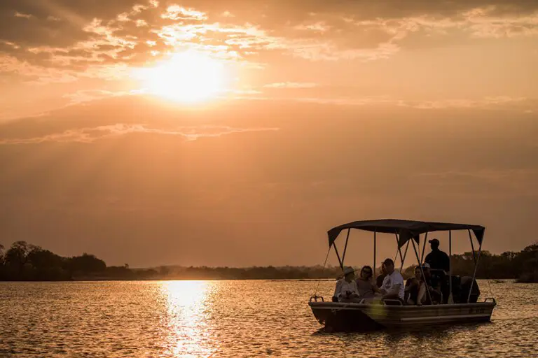 Sunset river cruise at Tongabezi Lodge.