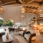 Incredible interior with a comfortable lounge, well-stocked bar and stairway leading to an upstairs stargazing deck.