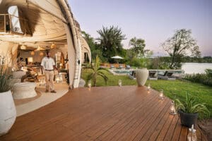 Main lounge, dining area and swimming pool.