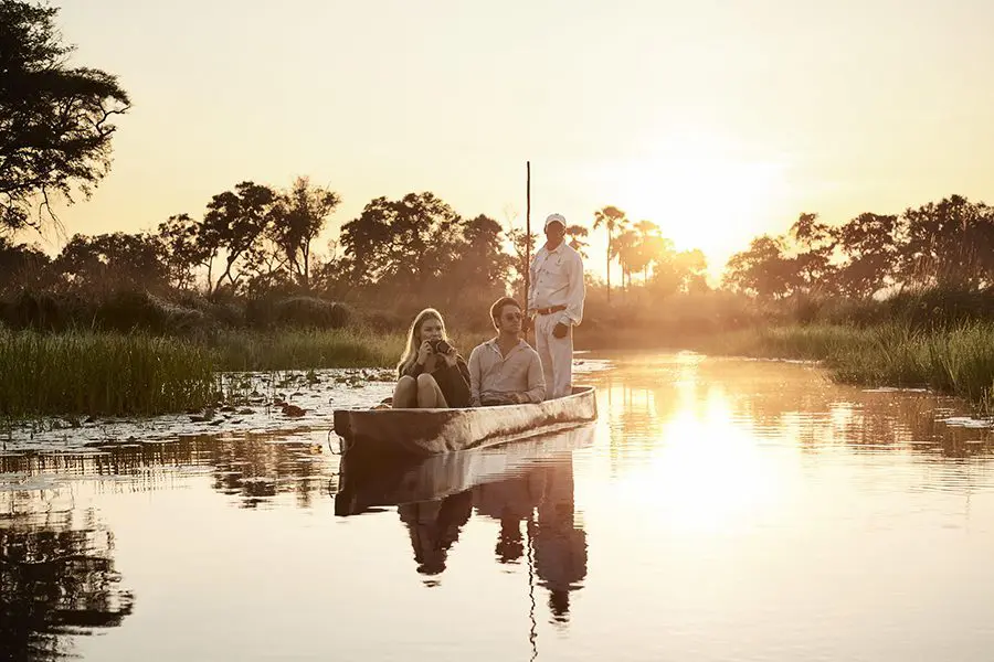 Paseos en mokoro en el campamento Sanctuary Baines, Delta del Okavango | Go2Africa