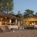 The main lodge area is next to the beach. 