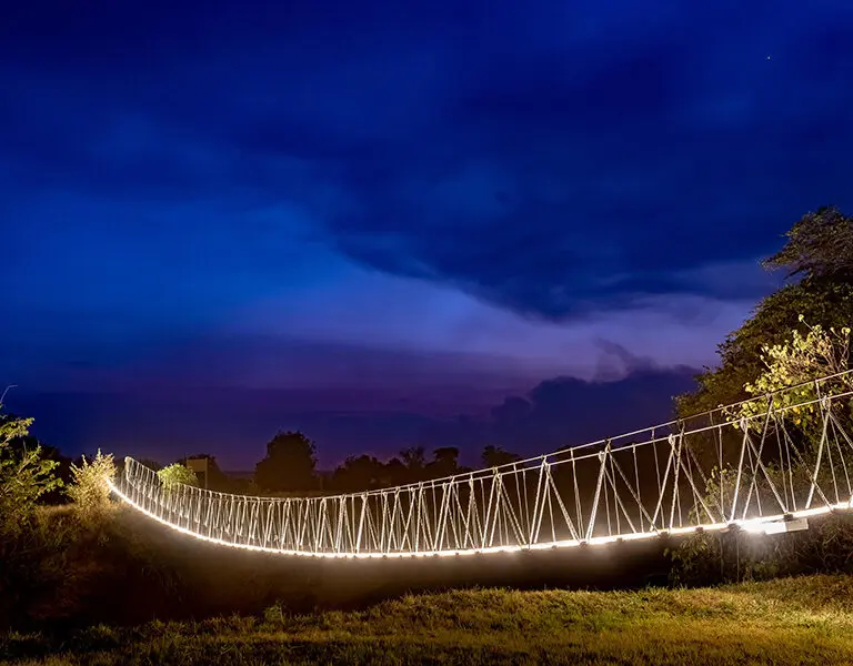 Walkways lit up at night.
