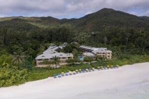 Aerial view of Acajou Beach Resort and beachfront.