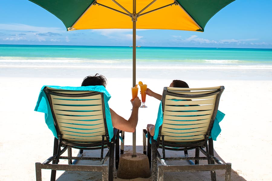 Enjoy a lazy cocktail on the beach loungers.