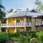 Exterior and lush greenery at Acajou Beach Resort.