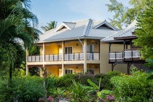 Exterior and lush greenery at Acajou Beach Resort.