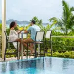 Dine poolside at Acajou Beach Resort.
