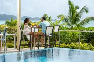 Dine poolside at Acajou Beach Resort.
