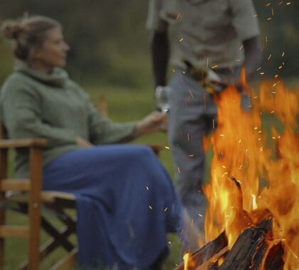 Sundowners around the bush camp fire