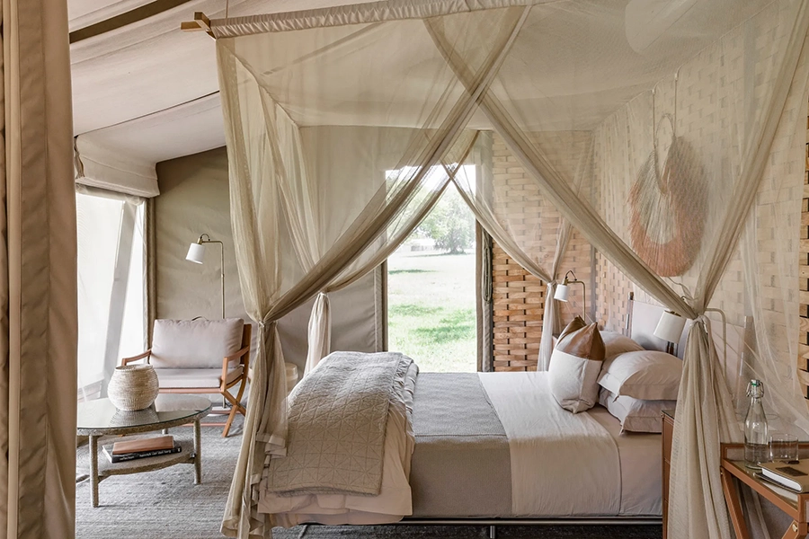 singita-sabora-tented-suite-bedroom-scaled