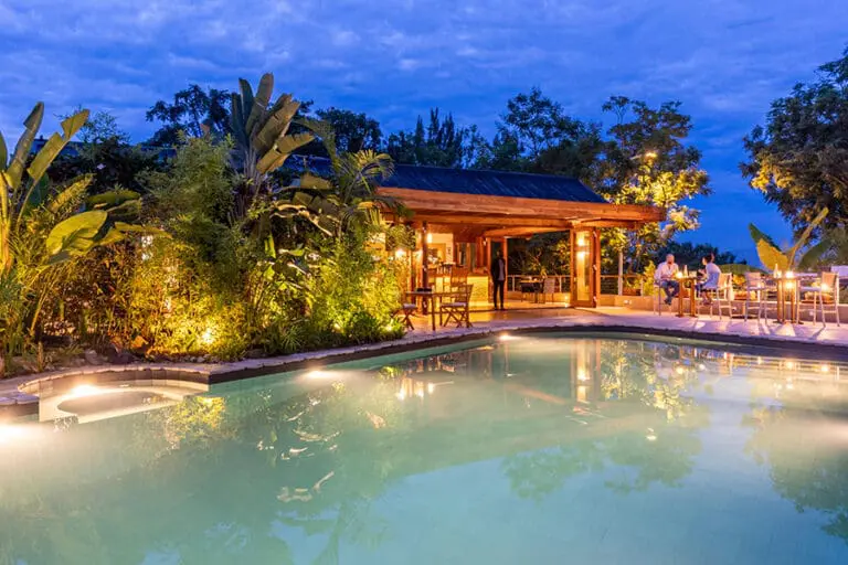 the-retreat-main-salt-water-pool-lighting-at-night