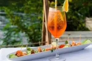 Sip a sundowner after a day spent on the beach.