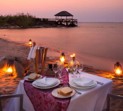 A romantic sunset beach dinner.