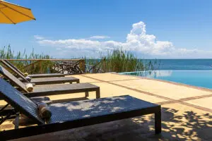 Lounge poolside with a drink and good book, or perhaps your binoculars to spot birds.
