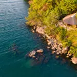 The chalets are dotted along the edge of the island overlooking the lake.