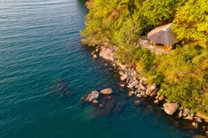 The chalets are dotted along the edge of the island overlooking the lake. 