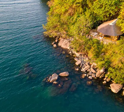 The chalets are dotted along the edge of the island overlooking the lake. 