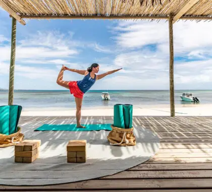 Yoga right next to the beach. 