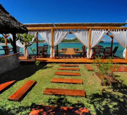 Lush gardens leading to the deck.