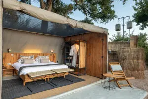 A comfortable bed with a retractable weatherproof roof revealing the night sky if you'd like.