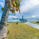Take a helicopter to Miavana Time + Tide. 