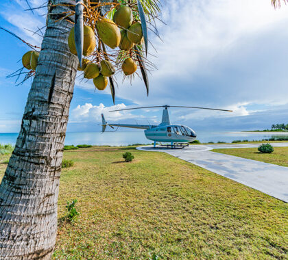 Take a helicopter to Miavana Time + Tide. 