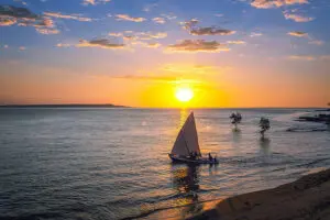 Take a sunset boat cruise off Madagascar's shore.