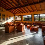 The main lounge area with large windows to take in the views.