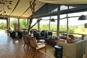 Floor to ceiling tent windows in the main area provide sweeping views from the lounge.