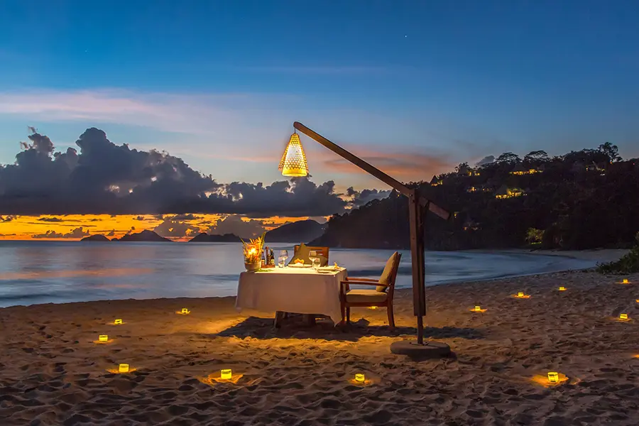 Enjoy dinner on the beach in the evening | Anantara Maia 