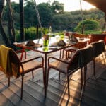 Dining on the deck overlooking the seasonal river.