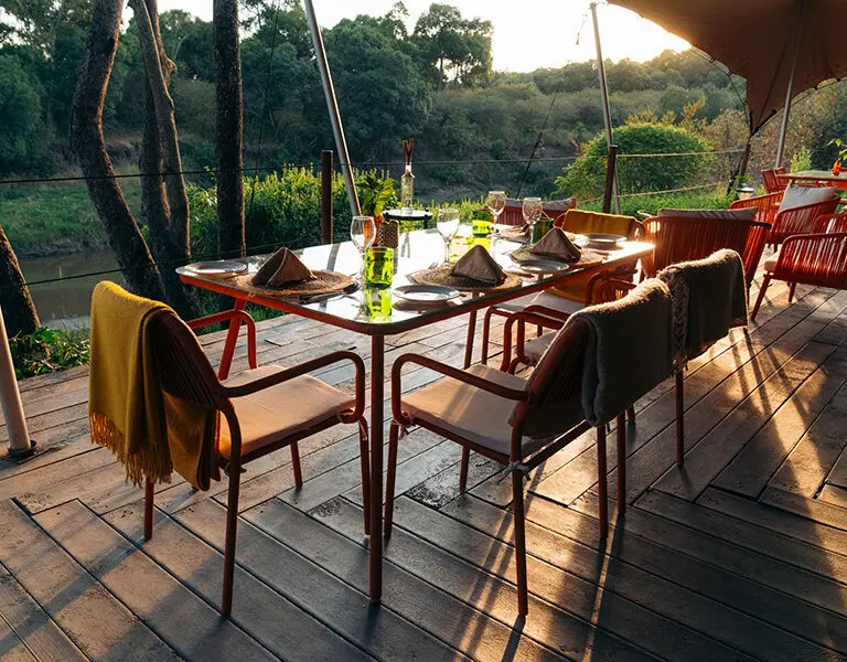 Dining on the deck overlooking the seasonal river. 