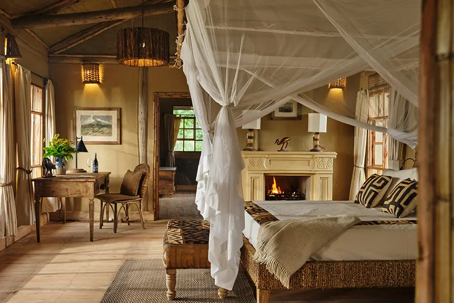 kibale-lodge-deluxe-bedroom-volcanoes-safaris