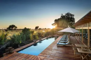 Take a dip in the swimming pool.