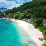 Carana Beach is located in a private beach cove, which is protected on either side by granite boulders.
