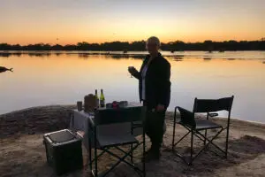 O icónico pôr do sol africano no Parque Nacional de Hwange, no Zimbabué. 