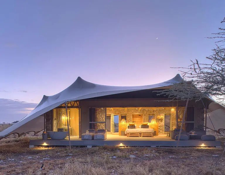 Stay in luxurious tented safari accommodation. 