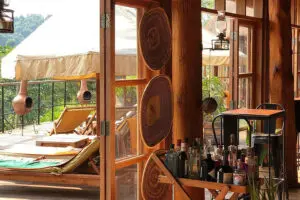 The deck is comfortably furnished with loungers to enjoy the warmth and chiminea firepits for cool evenings. 