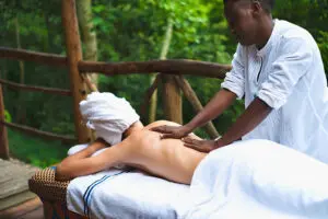 Indulge in a massage after a long day of trekking in Kibale Forest | Papaya Lake Lodge