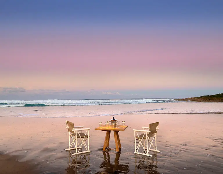 Romance your partner with private sundowners on the shore of the Wild Coast. 
