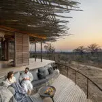 Wake up to the sounds of nature on your private deck in the wilds. 