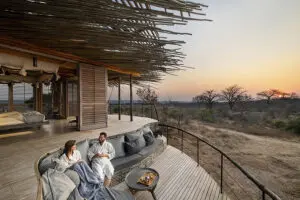 Wake up to the sounds of nature on your private deck in the wilds. 